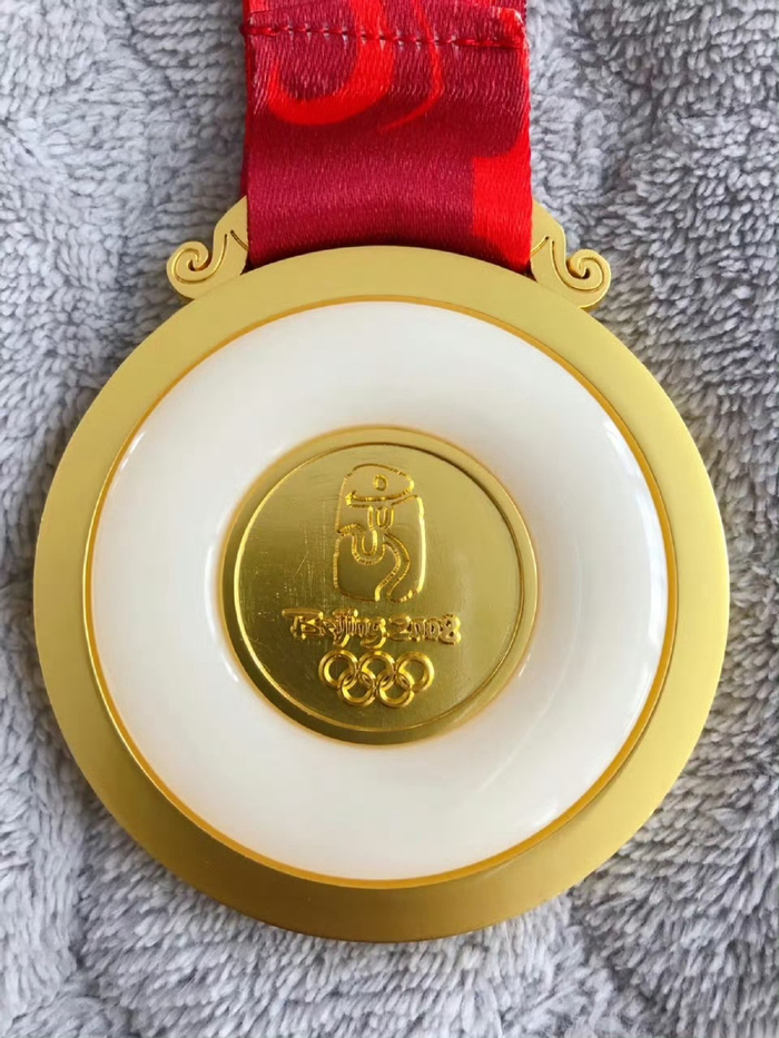 奥运会金牌不是纯金_08奥运会金牌是纯金的吗